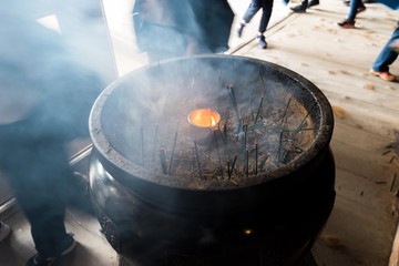 A cauldron where incense is burned.