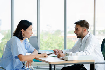 Fototapeta premium Hospital with expert doctors takes care of all patients. Caring with expertise, providing advice, discussing and encouraging to build confidence that treatment is the standard of the medical industry.