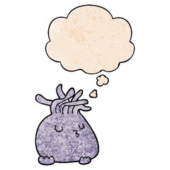 cartoon sea anemone and thought bubble in grunge texture pattern style