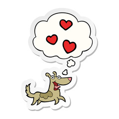 cartoon dog with love hearts and thought bubble as a printed sticker