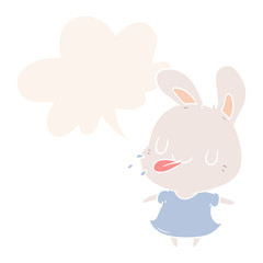 cute cartoon rabbit blowing raspberry and speech bubble in retro style