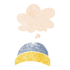 cartoon hat and thought bubble in retro textured style