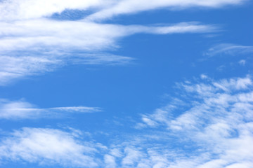 Naklejka na ściany i meble The vast blue sky background and white clouds