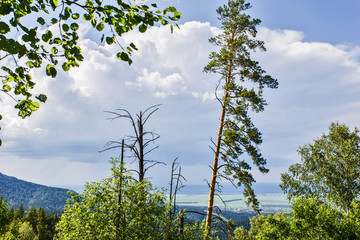 Obraz premium summer landscape with mountains and clouds