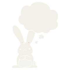 Obraz na płótnie Canvas cartoon rabbit and thought bubble in retro style