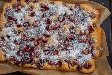 Home made chocolate vanilla cheery cake on a table