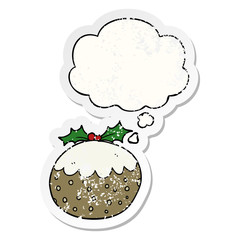 cartoon christmas pudding and thought bubble as a distressed worn sticker