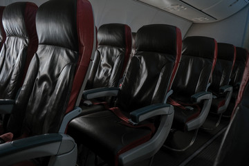 Fototapeta premium Empty Airplane seats in the cabin economy class