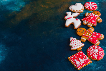 Christmas homemade gingerbread cookies on a dark background