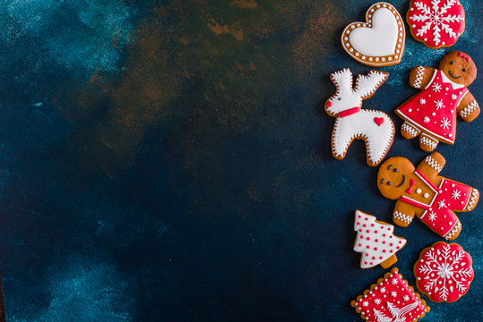 Christmas homemade gingerbread cookies on a dark background