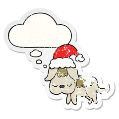 cute christmas dog and thought bubble as a distressed worn sticker
