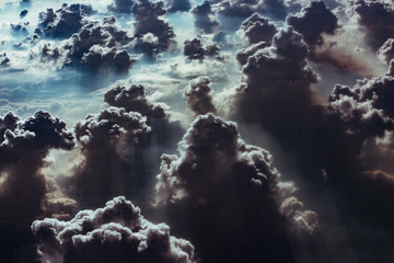 cloud and sky view from the window of an airplane