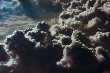 cloud and sky view from the window of an airplane