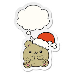 cute cartoon christmas bear and thought bubble as a printed sticker