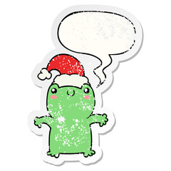 cute cartoon frog wearing christmas hat and speech bubble distressed sticker