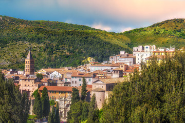 panoramic italian town of Tivoli near Rome in Lazio surrounded by a lush forest