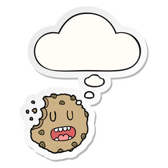 cartoon cookie and thought bubble as a printed sticker