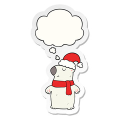 cute cartoon christmas bear and thought bubble as a printed sticker