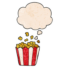 cartoon popcorn and thought bubble in grunge texture pattern style