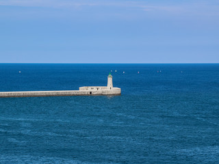 St. Elmo Lighthouse at harbor in Valletta, Malta.