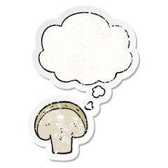 cartoon mushroom slice and thought bubble as a distressed worn sticker