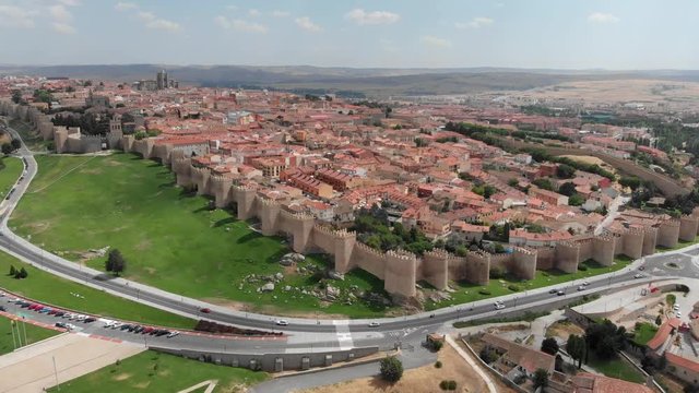 Flying over Avila, Spain. The city has medieval fortification walls. It has the highest number of Romanesque and Gothic churches per capita in Spain. Aerial shot, UHD
