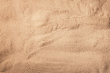 Fototapeta na wymiar Sand texture. Sandy beach for background. Top view.
