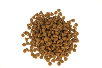 Dried food for dogs or cats isolated in white background. Pet care.