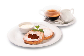 cheese pancakes on a plate with sour cream and coffee, isolated on white background, breakfast concept