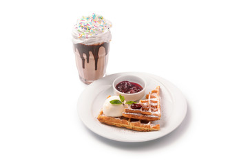 Waffle with scoop of ice cream and strawberry jam on a plate and milk cocktail , isolated on white background