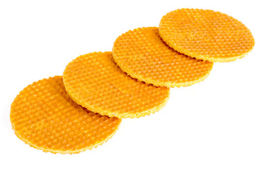 Crispy sweet waffle cookie on white background. 