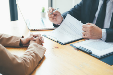 Attractive young business woman in a job interview with a corporate personnel manager