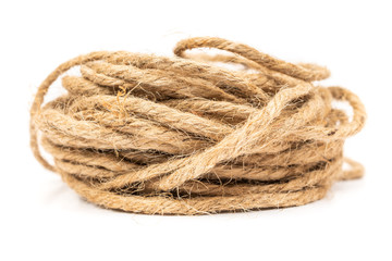 close up of brown rope coil on white background