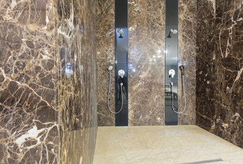 Interior of luxury shower room in hotel spa center