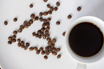 Coffee beans. Isolated on a white background closeup