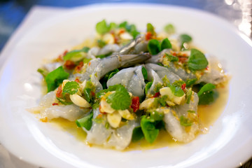 Raw shrimp in fish sauce spicy salad thai style. Fresh shrimp in spicy chili sauce with garlic and mint leave.