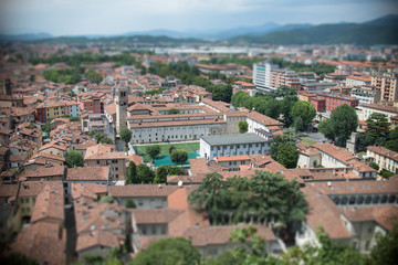 Fototapeta na wymiar View from the castle Brescia Citadela on old town, tilt shift effect