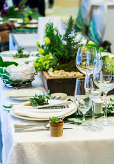 Luxury wedding party dinner table setting concept.