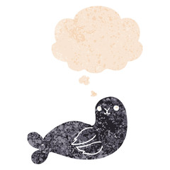 cartoon seal and thought bubble in retro textured style