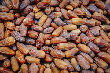 Heap of dried organic dates fruit.