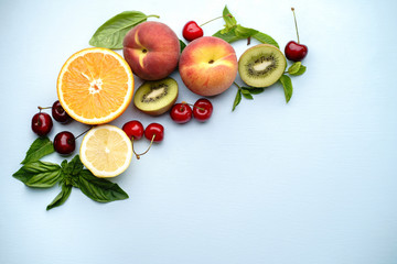 Summertime banner with pieces of ripe fruits, bright design. Creative summer idea, food background