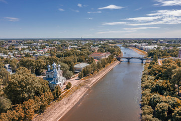 Scenic aerial view of river in ancient touristic town Vologda in Russian Federation. Beautiful summer sunny look of water in urban area of capital of russian province