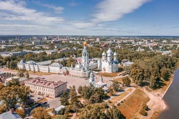 Scenic aerial view of old kremlin in ancient touristic town Vologda in Russian Federation. Beautiful summer sunny look of orthodox temple in fortress in urban area of capital of russian province