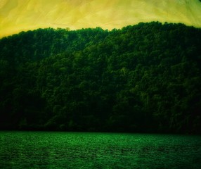 green hills with green lake beneath