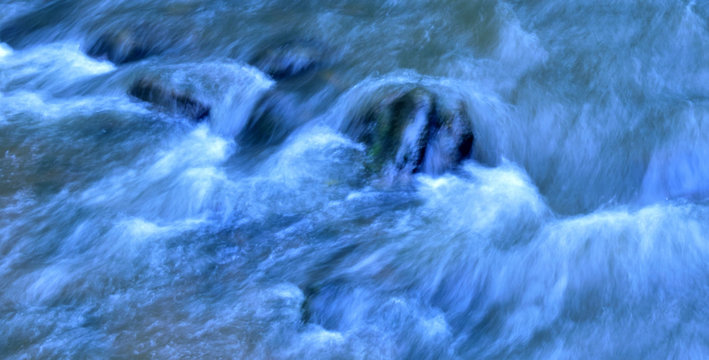 Water Rushing Over Rocks