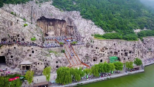 Aerial landscape of buddha statues in the main Longmen Grotto (Fengxian Cave). Chinese Buddhist art Longmen Caves (Dragon's Gate Grottoes in chinese), Luoyang, Henan province, China
