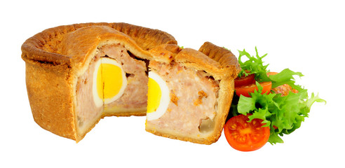 Crusty egg and pork filled savoury pie isolated on a white background