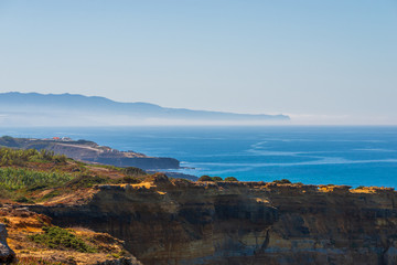 Fototapeta premium Scenic panoramic view. Seascape with cliffs and nature at the coast of sea or ocean
