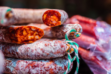 Rustic Chorizo Sausage In the spanish farmer market. Selective focus. Bokeh
