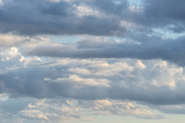Naklejka na ściany i meble Cloudscape with dramatic cumulus сlouds on sky